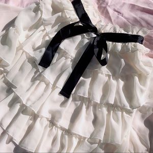 Frilled Off-white Blouse with Black Bow